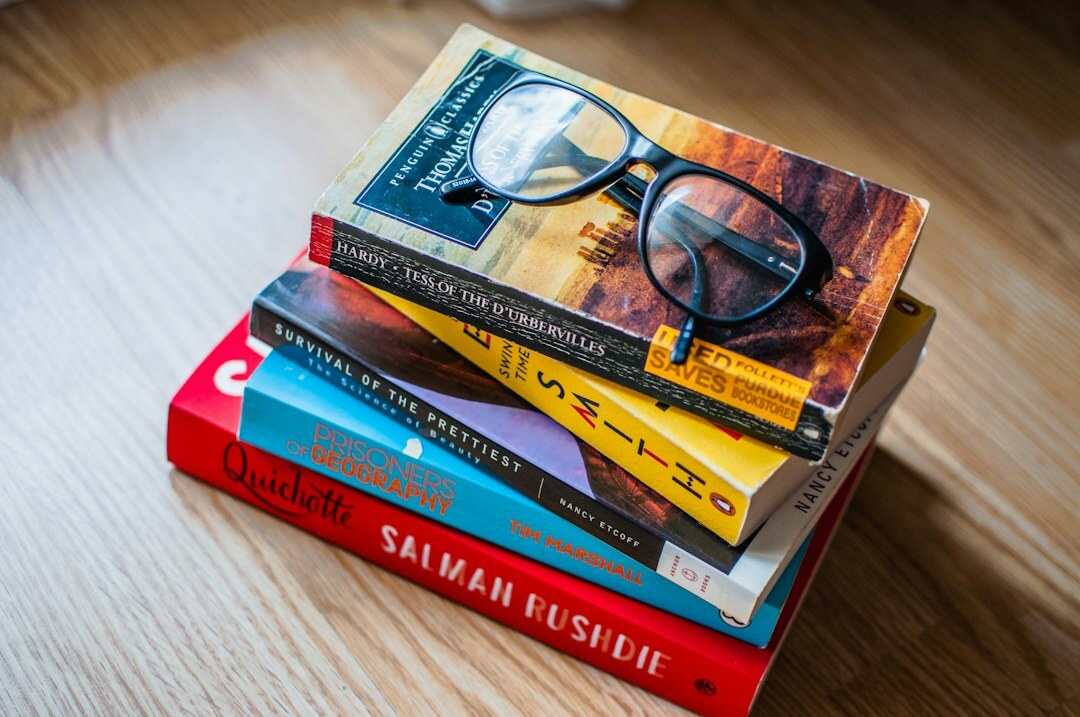 stack of mystery novels on table